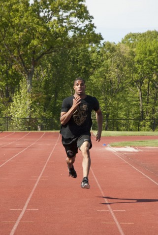 Senior Ian Parnell practices running for the track and field team. Ian will be attending the University of Pennsylvania and is excited to run for the Quakers next spring. Photo by Gabby Troya.