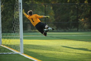 Goalie George Wangensteen dives for a ball in the team's 3-2 win over Dalton on Fall Sting. Photo courtesy of David Wahrhaftig.