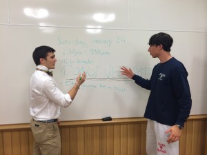 President Damis Yancopoulos and Community Council Member Mike Leonard plan out the Winter Semi-Formal. Photo by Angela Mauri.