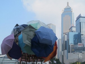 Protesters shield themselves from tear gas in Hong Kong. Photo courtesy of Jemina Barr.