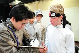 Senior Tim Steinberg, far right, prepares to fence at an Ivy League meet. Photo by Chris Taggart.