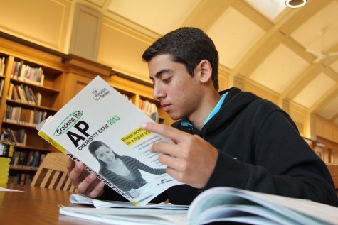 Junior Youssef Asaad studies for his AP Chemistry exam.