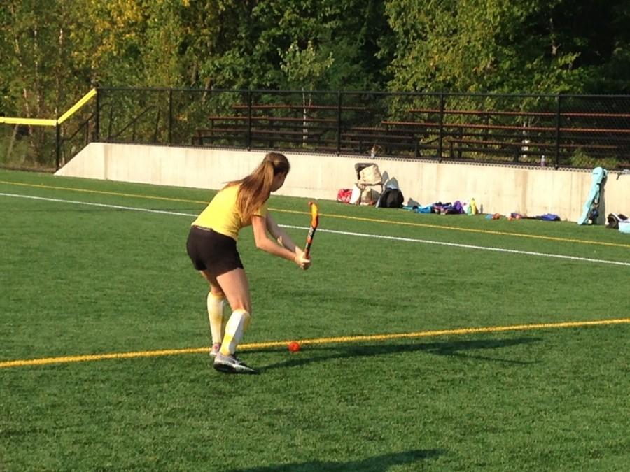 Freshman Karina Bridger winds up in the longest drive competition during field hockey pre-season.