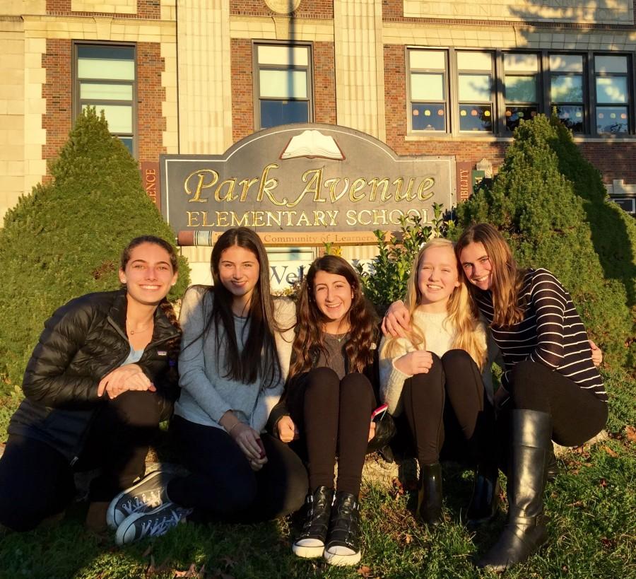 From left to right: Underclassmen Lexi Schechter, Grace Rubin, Jess Feldman, Isla Parton and Cosima Boettner pose outside the Park Avenue School in Port Chester after volunteering with elementary students.