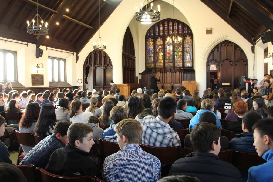 Freshmen and sophomore students fill the chapel as they respectfully watch contestants emotionally, comically, and passionately recite her favorite poem during the Poetry Out Loud competition.  