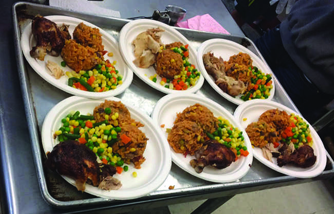 Club members make delicious meals for the low-income families in White Plains.