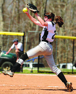 Freshman star Dana Van Buren throws a pitch on the softball field. 