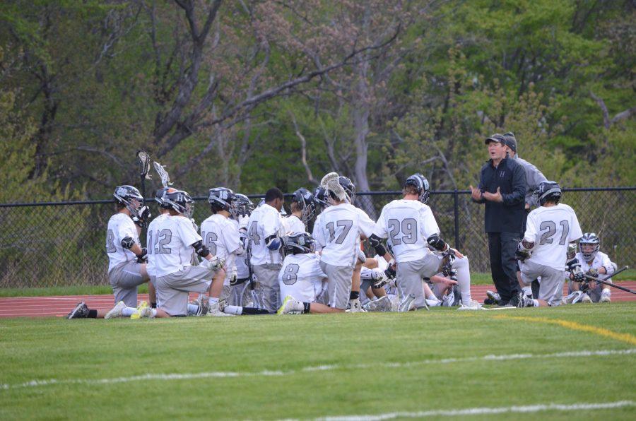 Coach Arnold motivates the Boys’ Lacrosse team at half-time, helping them to capture an overtime win against Stepinac.