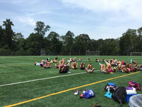 The Girls’ Soccer team does core exercises to work on strength. The team is excited for the busy season ahead.