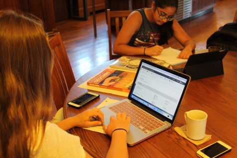 Many students prefer to use laptops because of the larger screen and keyboard.