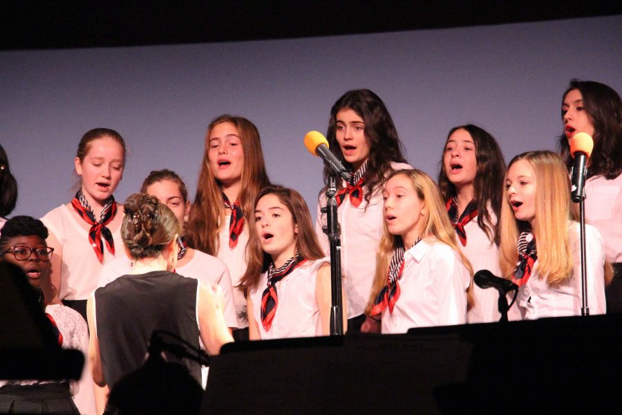 The chorus performs in the Collage Concert.