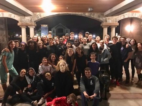 Volunteers from Community Council and the greater Upper School student body smile at the conclusion of the successful Haunted House event.