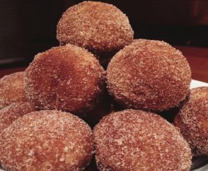 A delicious display of apple cider donut holes.