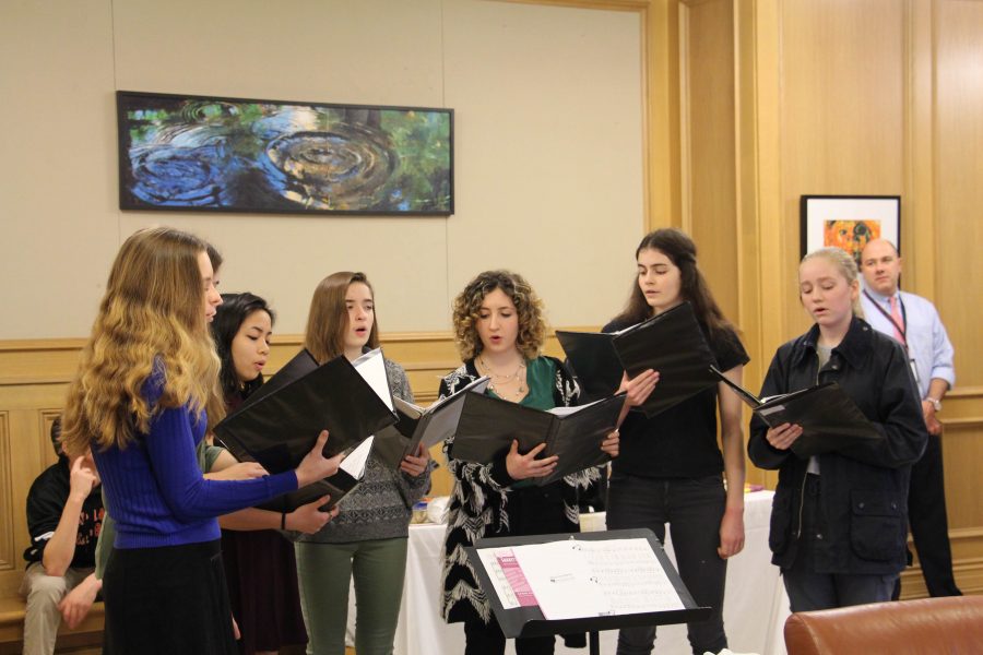 The Female A cappella group performs at the winter Bridge and Tunnel performance.