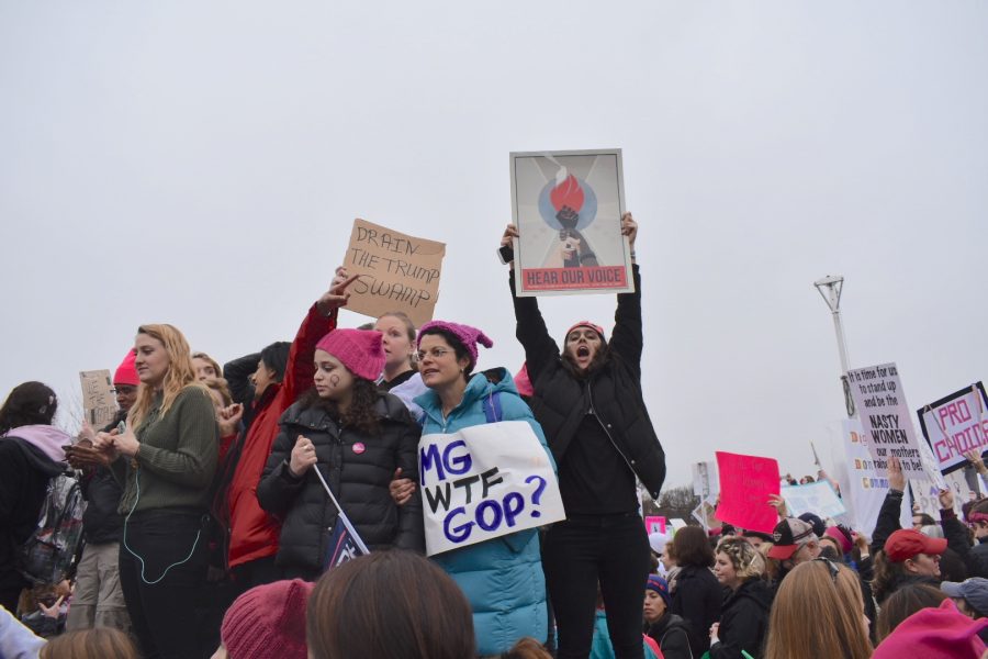 Co-president of Dux Femina Facti, senior Lila Wolfe joins protesters in a chant at the Women’s March on Washington following President Trump’s inauguration. The march was organized as a way for citizens to express their desires for equality.