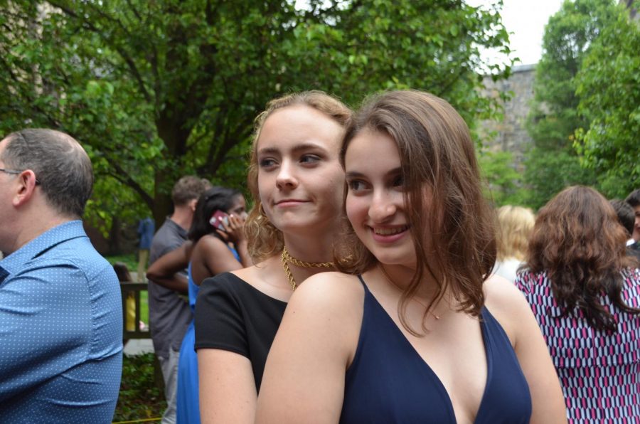 Junior Frances Shaeffler and  Ella Zaslow enjoy Pre-Prom festivities. Upper School students gathered outside Allen Hall for photographs with their friends and dates. Fortunately,  the weather held out for the occasion. 
