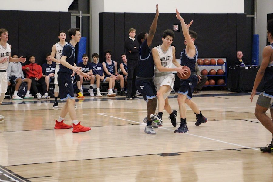 Boys Varsity Basketball fights a hard battle against Poly Prep in the Winter Sting