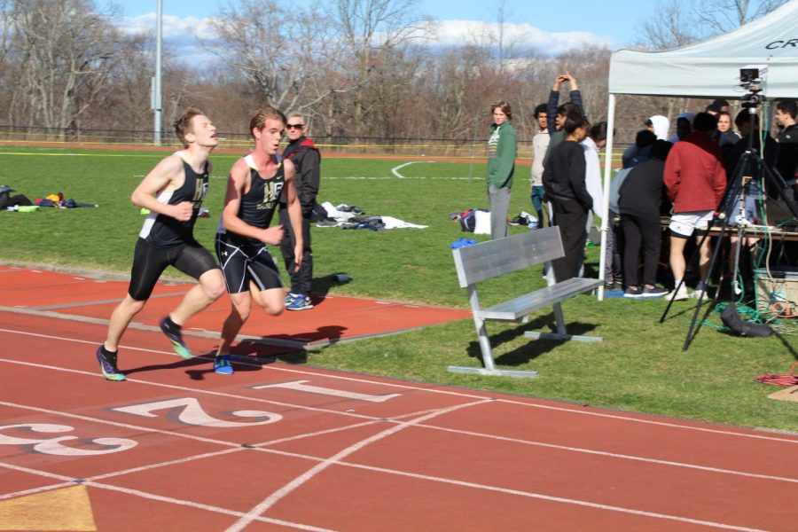 Senior captain William Crainer and Junior Hudson Kelley come to the finish line of the 3200. In their first meet, they both qualified for NYSAIS.