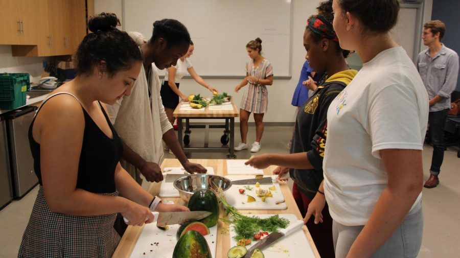 Students cut and prepare the fresh fruits and vegetables that they will put in their salads. After gathering the ingredients, the Stone Barns educators discussed the concept of emulsions and making a dressing that has a healthy balance of oil and an emulsifier.