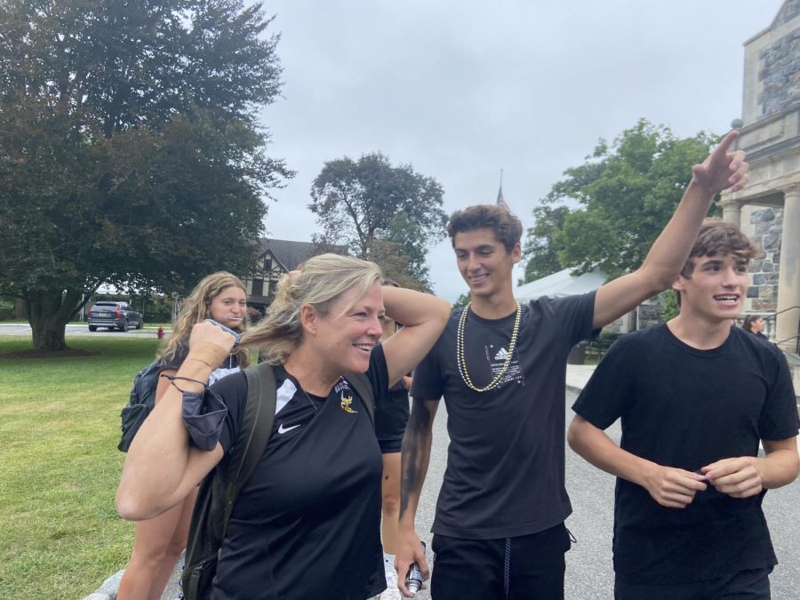 At 10:45 am the entire Upper School gathered on the quad for a pep rally ahead of the Sting. Senior dean Ms. Stanek had her hair spray-painted black in order to show her Hackley spirit.