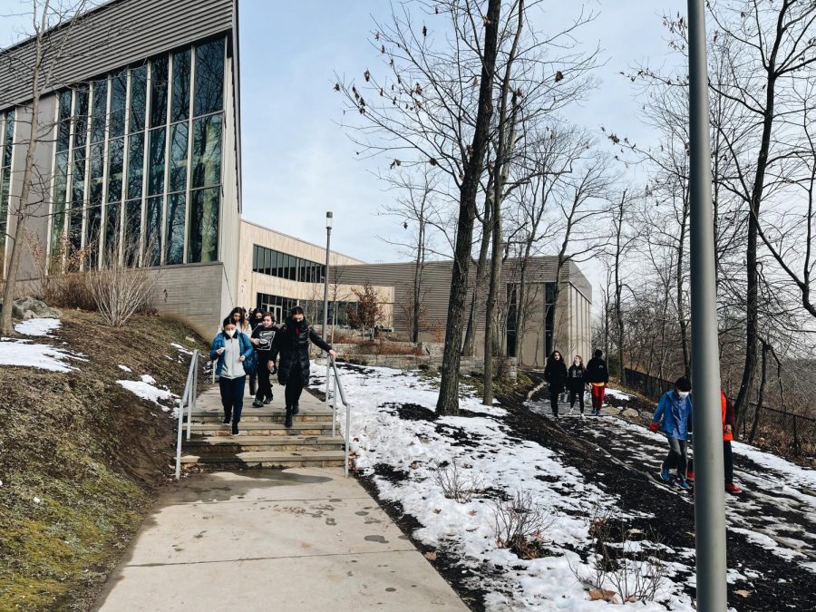 Students walk down from the Johnsons center after lunch. Walking up to the Johnsons Center is challenging due to the number of stairs and sheer distance from the main school buildings. Having no other choice but to walk up for lunch and sports is especially difficult for those with physical disabilities.