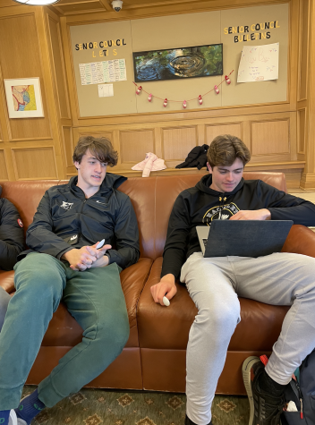 Seniors Devin Bernstein (left) and Luke Best (right) relax in the Senior Lounge with their spoons in their hands. Students are safe from having their spoons stolen as long as they are holding them in their hands.