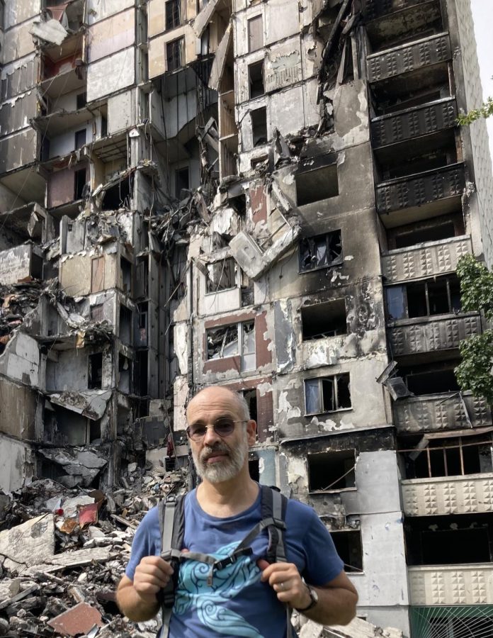 Mr. Klimenko in a bombed-out residential area on the outskirts of Kharkiv, a city not far from the Russia-Ukraine border.