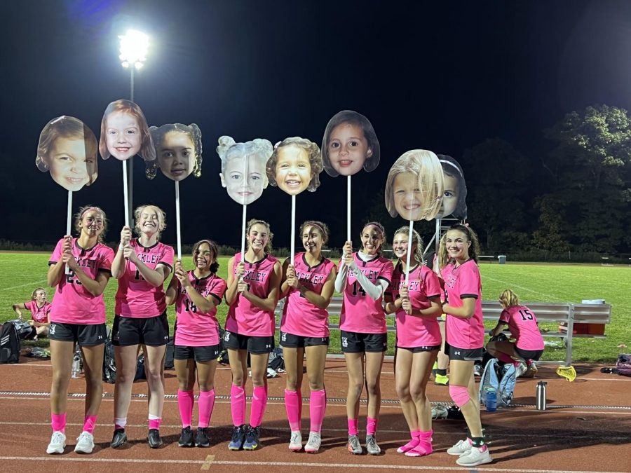 The+Hackley+girls+varsity+soccer+team+has+9+graduating+seniors+this+year.+To+reflect+on+their+growth+at+Hackley%2C+they+hold+their+baby+photos.+The+seniors+played+an+amazing+last+Dave+Allison+game+with+2+seniors+having+goals+and+1+having+an+assist.
