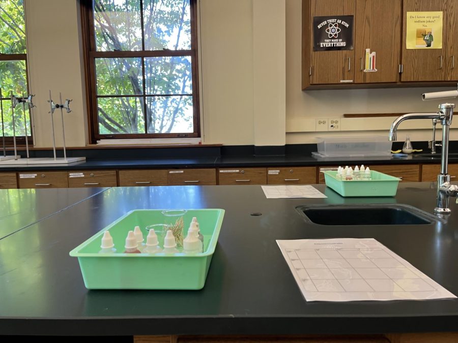 Students get set up to do their first lab. Accelerated Chemistry students will be applying what they learned in the first few weeks of school to their lab.