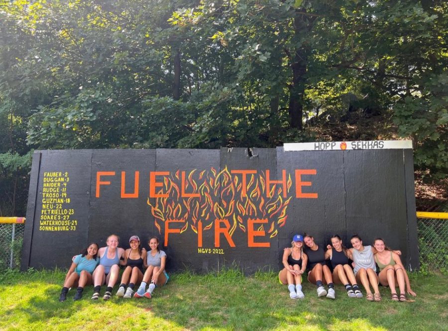 The Hackley girls varsity soccer seniors at the beginning of the season after finishing painting the board on King field. They chose the theme Fuel the Fire to represent the team attitude for this season. It is a tradition for the seniors to pick a theme and paint the board on King each season.