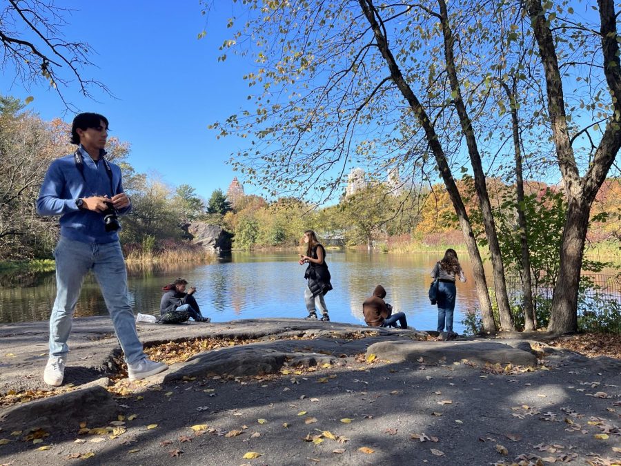 With their cameras, students were ready to head to a new location in the park. They stopped along a small body of water to capture the reflections of the trees on the water. This was towards the end of the trip and many students were taking a minute to soak in their surroundings.