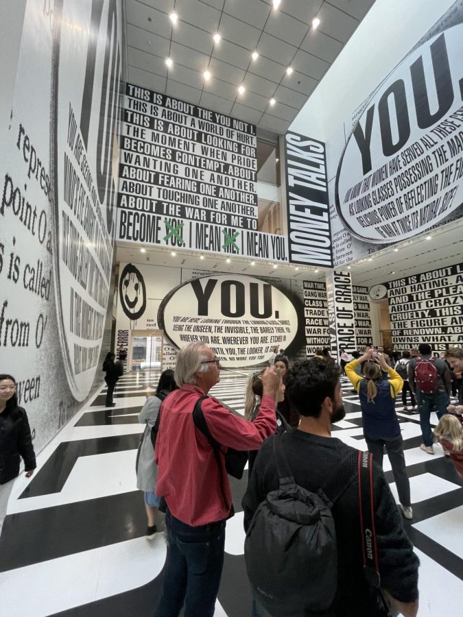 Located on the second floor of the MoMA is Barbara Krugers art exhibition.  The combination of large images and font grabs the viewers attention, leaving them curious. Many students stopped in their tracks to look around the room and take it all in.