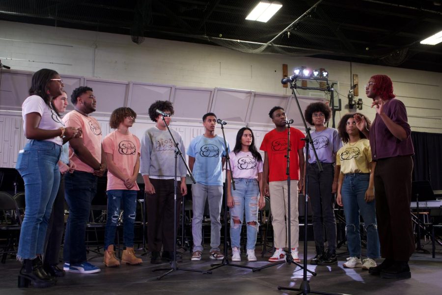 The acapella group waited for a signal from their leader to begin singing. They sang a variety of songs that touched the crowd in different ways. Some students even explained that the performance got them emotional.  