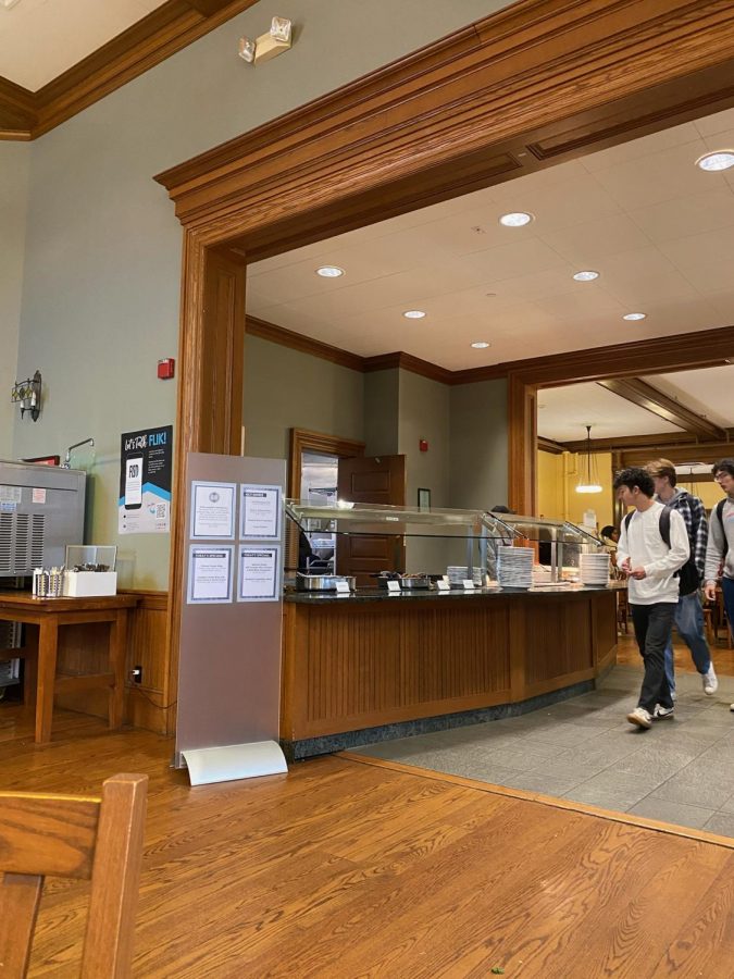 Students examine the lunch as they walk into the dining hall. Some days the hot lunch is not as popular, in which there are almost no lines at lunch.