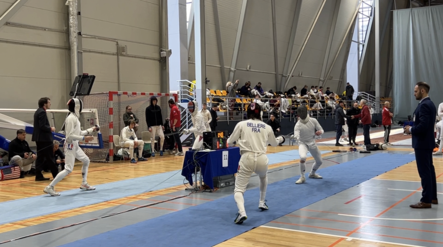 Aiden fences in the first round of the Junior World Cup in Latvia. Aiden said that although he was intimidated, the setting of the tournament was very similar to the US ones. 