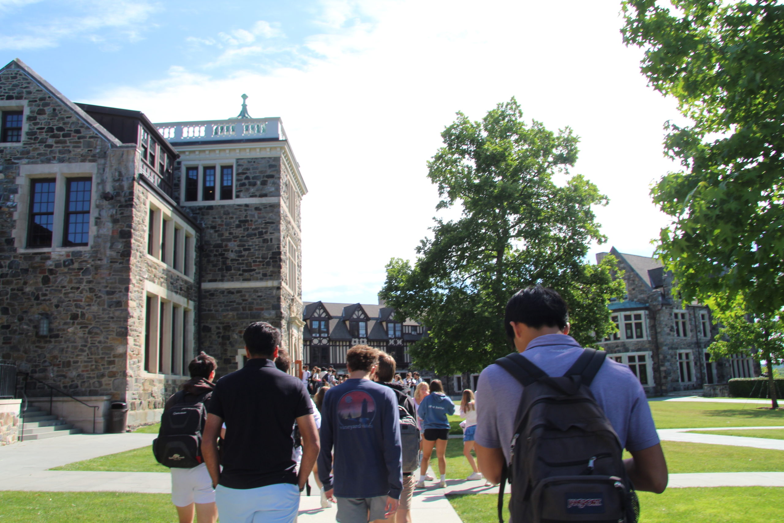 Juniors and sophomores walk to the Quad. After being instructed to go back inside or stay outside, the students either line up along the halls or encircle the Quad. The seniors final destination on the Graduation Walk was the through the senior lounge and onto the Quad.