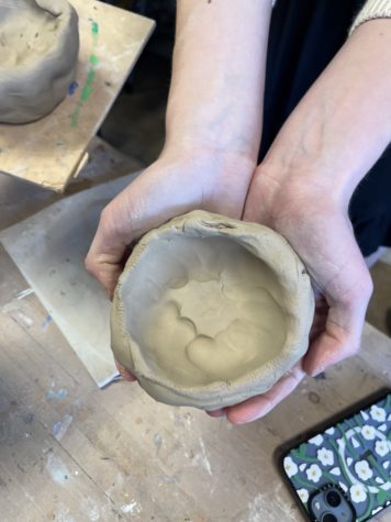 When sophomore club member Abigail Beyrich attends Pottery Club, she enjoys making pinch pots. These are then fired and then glazed!