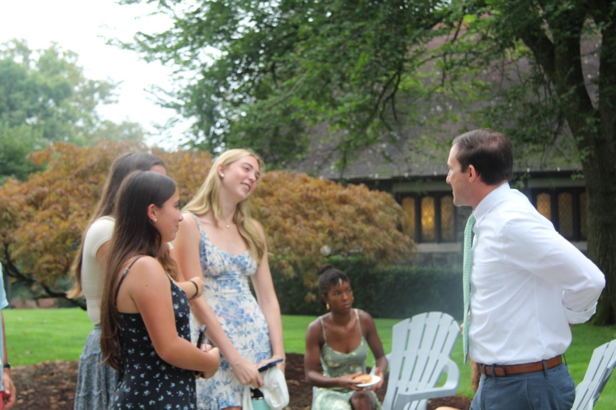 Seniors Charlotte Feehan, Caroline Didden, and Enya Walsh meet Head of School Mr. Franklin. Mr. Franklin and his wife personally greeted each senior with a handshake and welcomed them into their home with a breakfast spread.