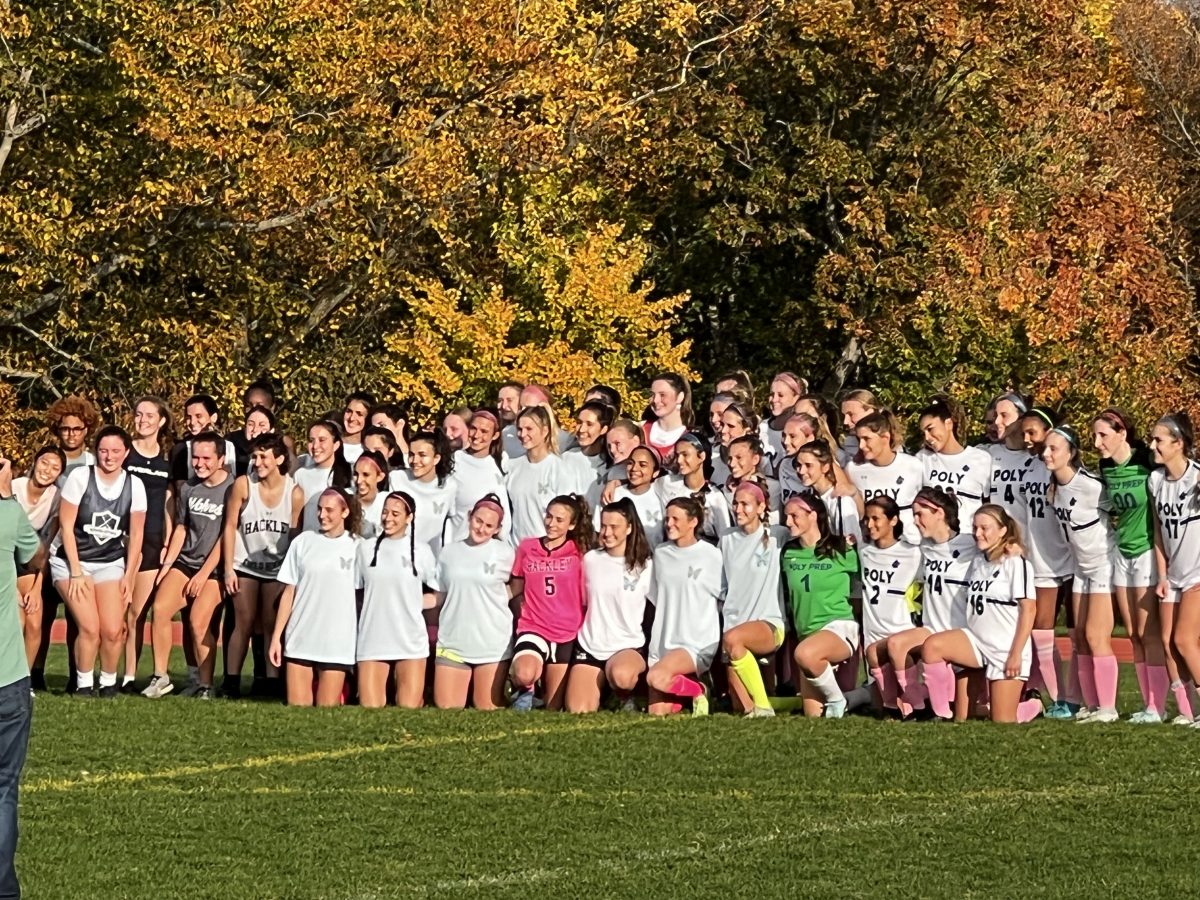 Hackley Girls Varsity Soccer and Field Hockey teams alongside Poly Prep Girls Varsity Soccer team after coming together to learn about Morgans Message at a soccer game on Pickert Field.