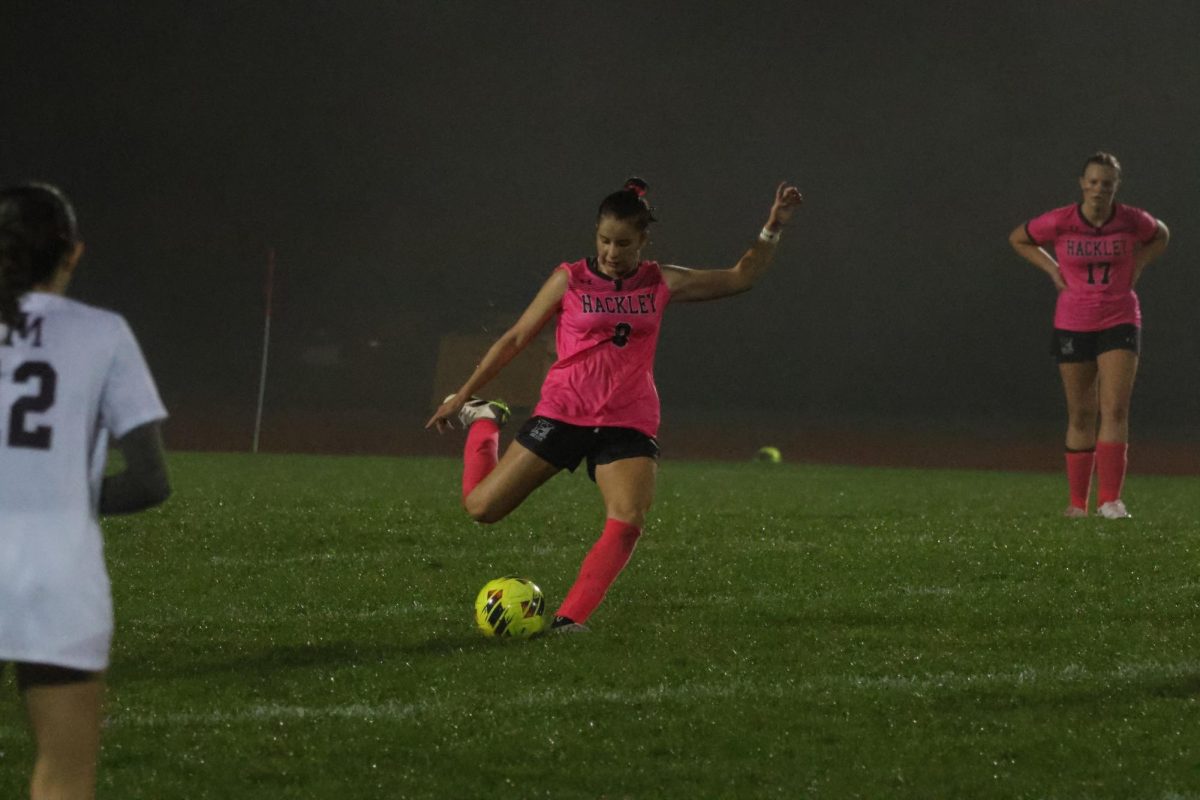 Freshman Gemma Lasky takes a shot. Girls Soccer kicked off Alumni Weekend on Friday night. The team held their annual Dave Allison game to honor Dave Allison, a former coach.