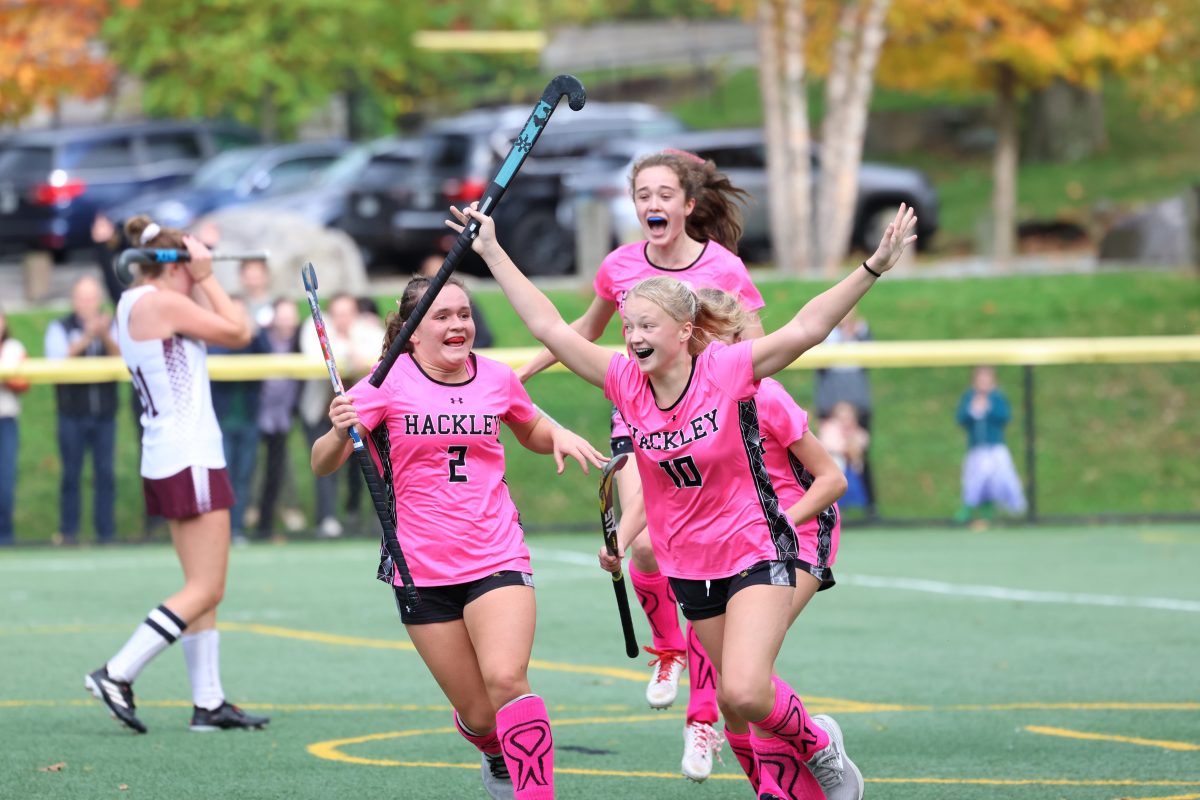 Senior+Lulu+Bednar%2C+Junior+Devyn+OCallaghan%2C+and+Sophomore+Fiona+Pedraza+celebrate+their+win.+Field+Hockey+played+Horace+Mann+at+2%3A30p.m.+The+girls+won+2-1+in+overtime.
