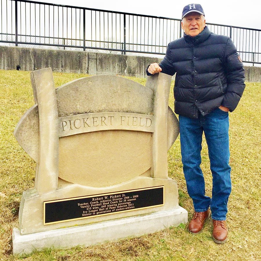 Coach Robert Pickert was honored with a commemorative plaque outside of the football field. It stands for all to see in the entry way to the bleachers. Inscribed on the base says, Mentor to generations of student-athletes among other notable achievements of Pickerts career.  