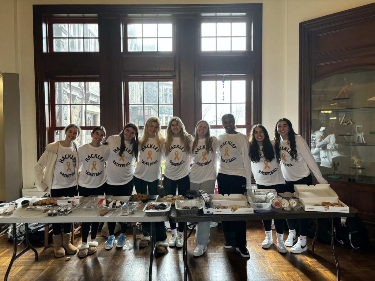 The girls and boys basketball teams ran the bake sale for the Coaches vs Cancer tournament. The profits were donated to the American Cancer Society. The teams raised a combined over 1400 dollars.