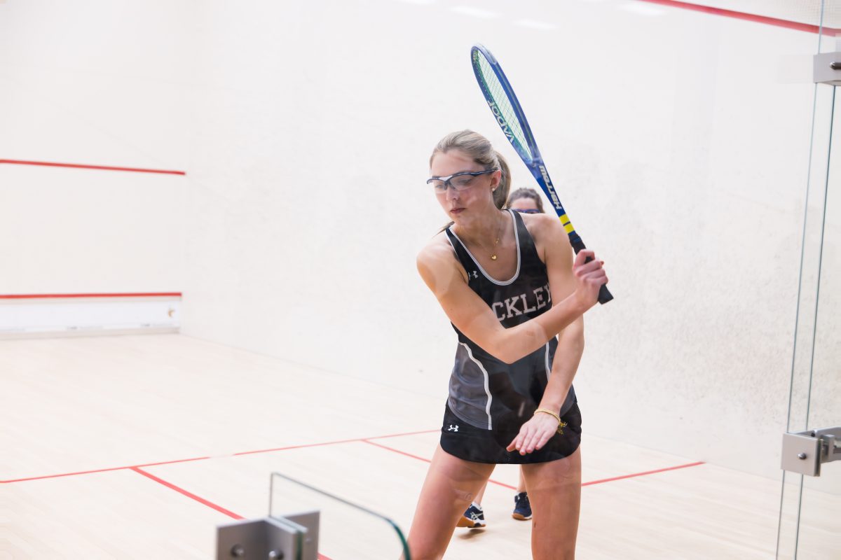 Senior+Caroline+Didden+serving+the+ball+in+her+match.+The+team+played+RCDS+and+won.+Girls+Varsity+Squash+ended+the+season+undefeated+in+the+Ivy+League.