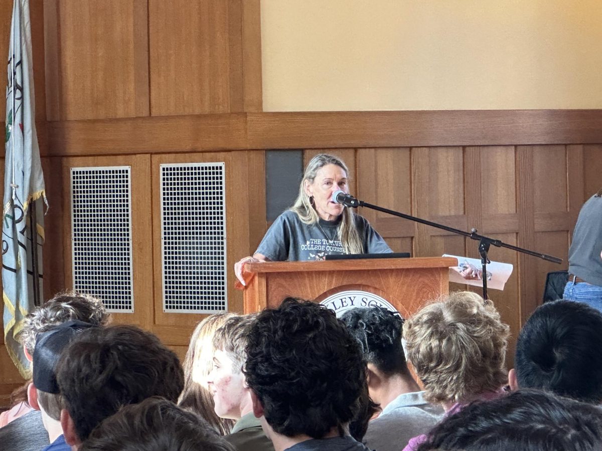 Kassy Fritz, the Director of College Counseling, speaks to seniors about the application process and upcoming deadlines. Ms. Fritz joined the Hilltop this summer, as former Director of College Counseling, Jean Nadell, will be departing following this school year. At the end of college counseling's presentation, the seniors participated in a game guessing where different photos were on Hackley's campus.