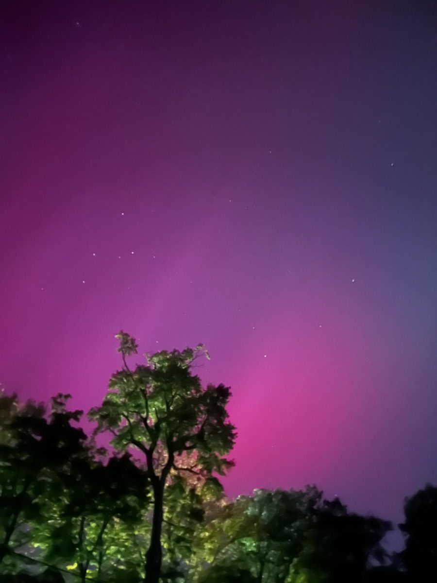 The pink and blue auroras were visible in the sky in Ossining, NY at approximately 7:40 p.m. The auroras were more visible in Westchester and Northern New York than in New York City, where there is more air pollution and light pollution. iPhone cameras are better at picking up the light than a human's naked eye.