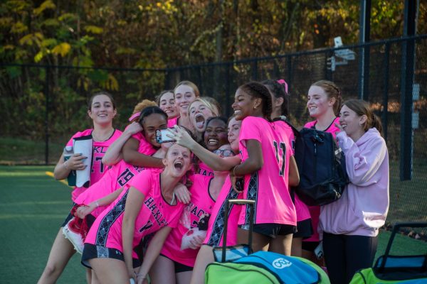 Field Hockey senior captain Lizzie Doherty takes a team selfie celebrating their huge 4-1 win vs. Riverdale on Alumni Day, which included a three goal performance by senior Devyn O'Callaghan.