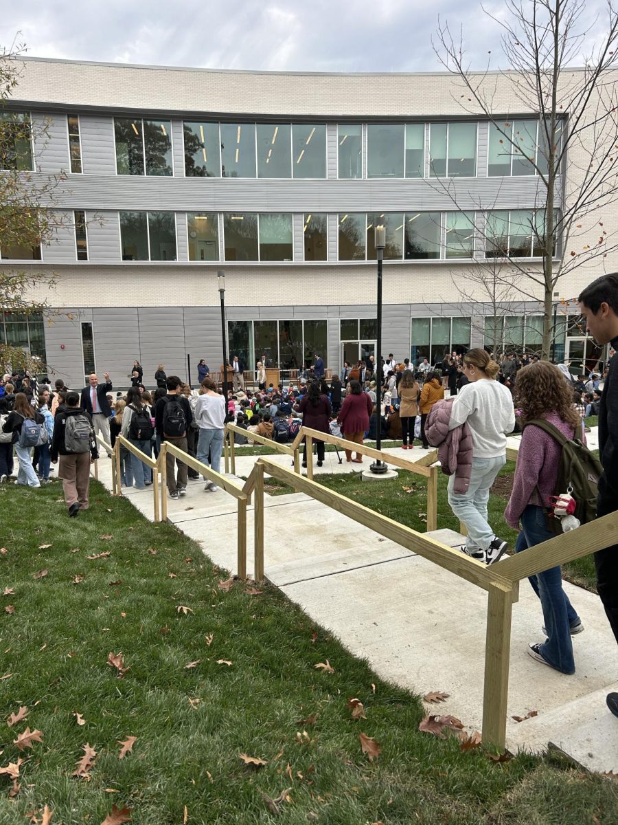 All students gathered down at the new outdoor amphitheater to attend the opening of the building. The space was filled with excitement and joy as the students listened in to the announcements and musical performance. 