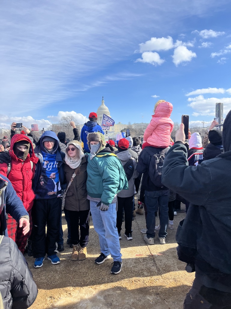 A group of Trump supporters pose for a picture minutes before Trump was sworn in. They were hoping Trump would venture into the cold and greet them. 