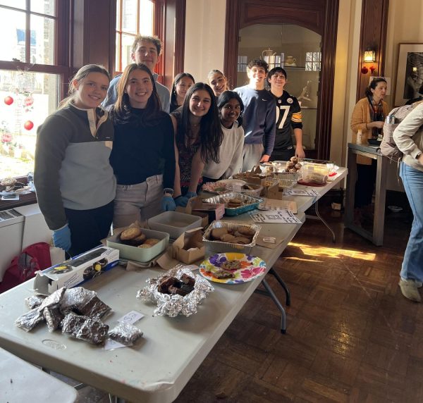 Sophomore volunteers Lily Rodgers, Sophie Kim, Owen Spencer, Lilly Rosenthal, Emi Dotter Se, Gabrielle Paes, Caitlin Morrow, Josh Gandelman, and Tyler Stern all came during Upper School lunch to help out and work the bake sale table, selling nearly every baked good.